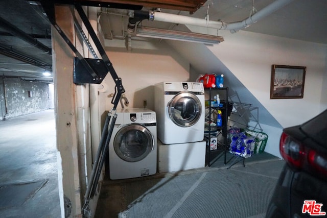 laundry area featuring washing machine and dryer