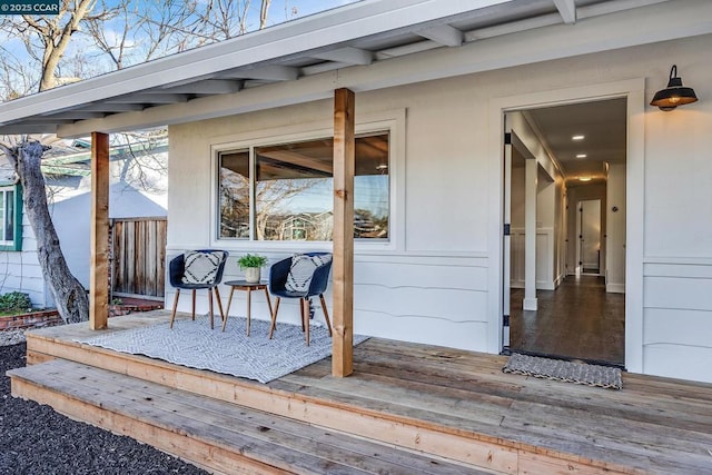 property entrance featuring a deck