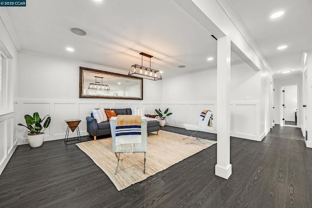 interior space with crown molding and dark hardwood / wood-style floors