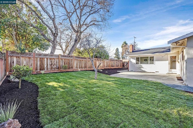 view of yard with a patio area