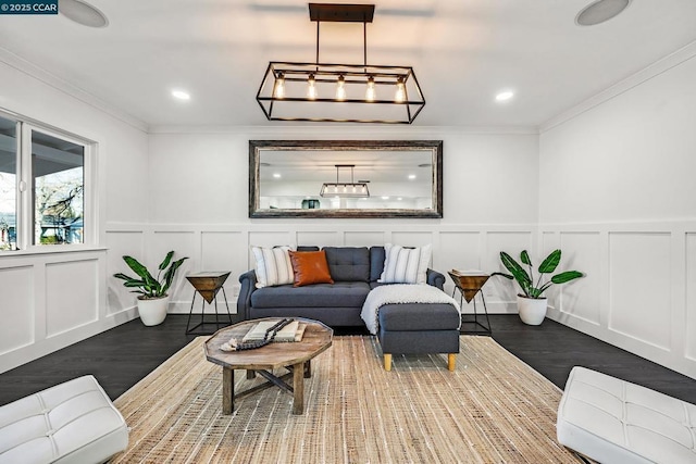 interior space with ornamental molding and dark hardwood / wood-style flooring