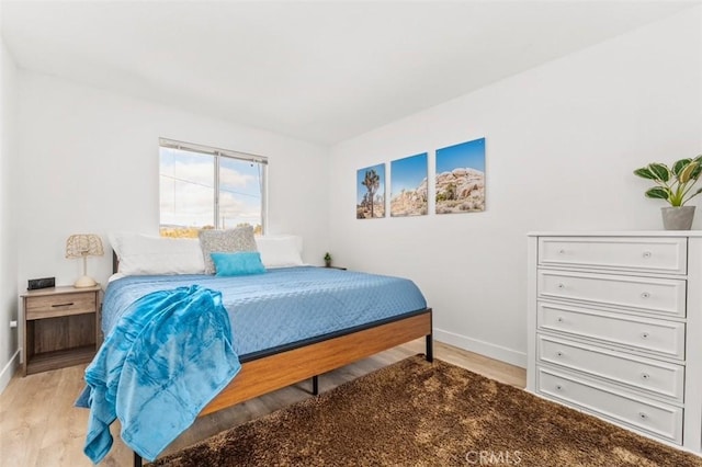 bedroom with light hardwood / wood-style floors