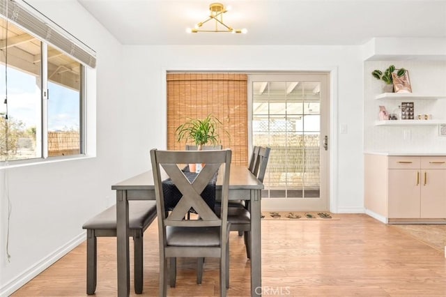 dining space featuring light hardwood / wood-style floors