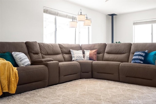 living area with light colored carpet