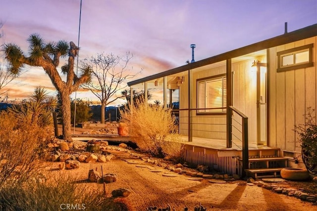 view of property exterior at dusk