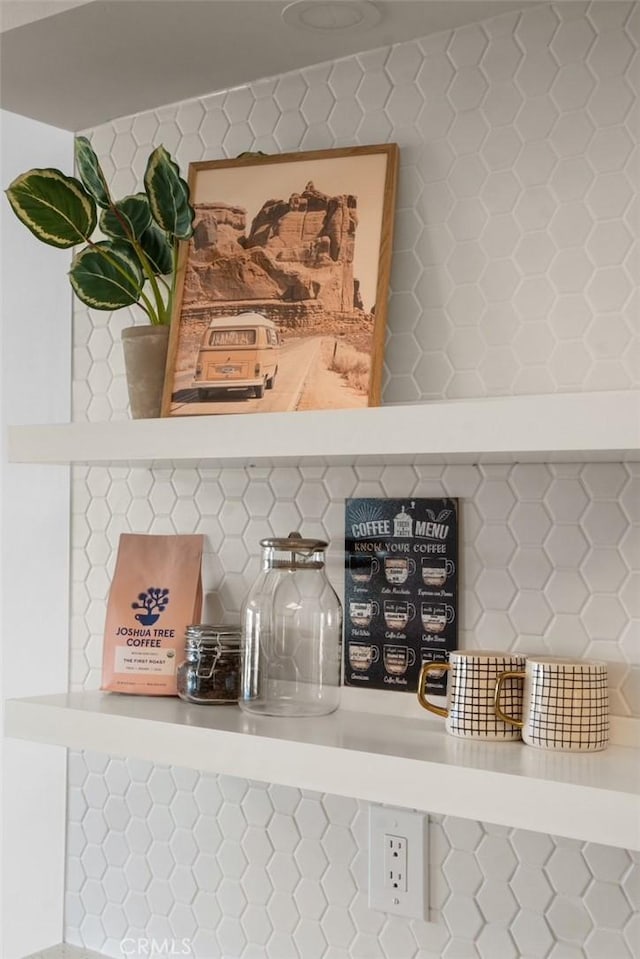 room details featuring decorative backsplash