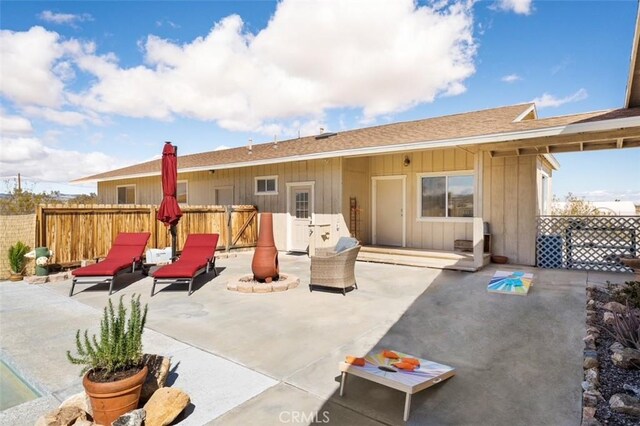 back of property featuring a patio area