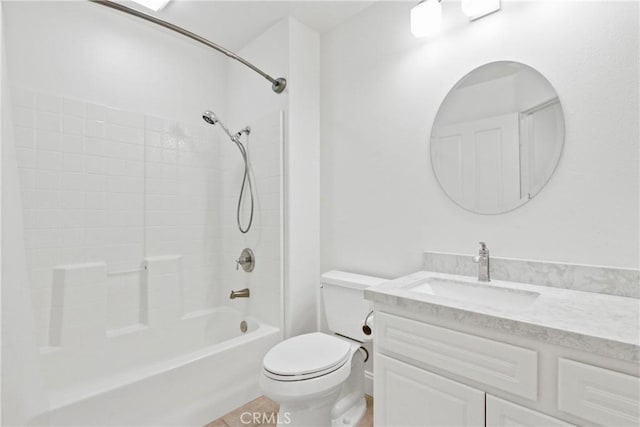 full bathroom featuring tile patterned flooring, vanity, bathtub / shower combination, and toilet