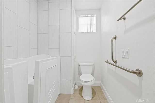 bathroom featuring tile patterned floors and toilet