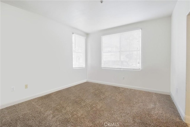 view of carpeted spare room