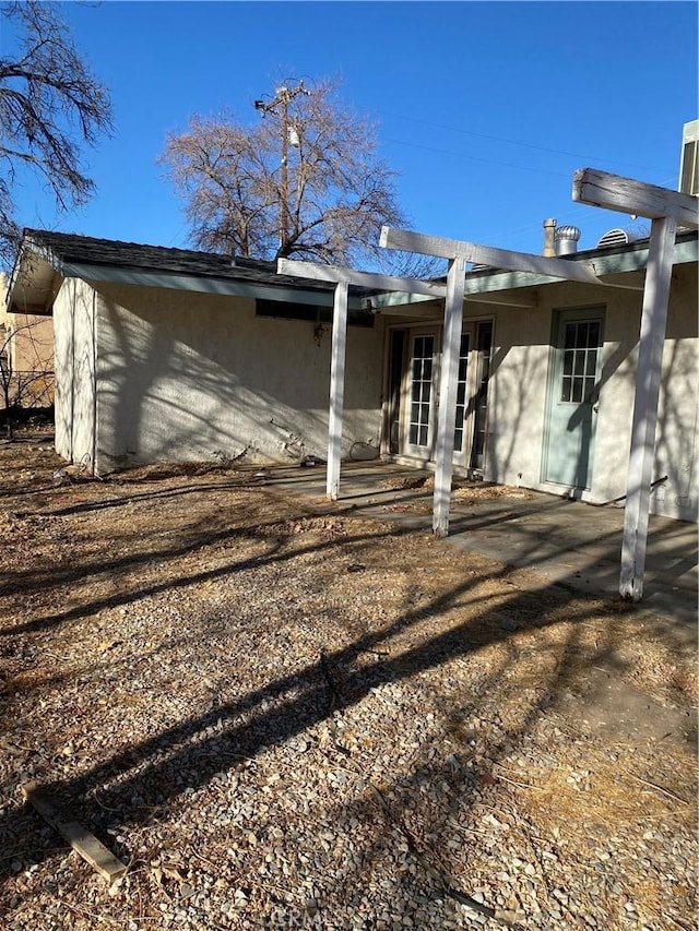 back of house featuring a patio area