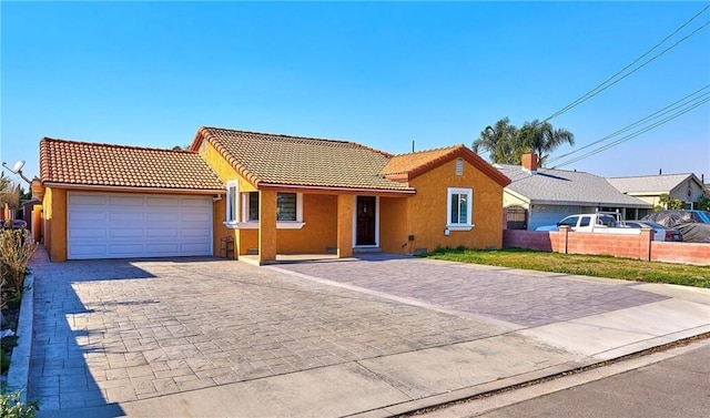 single story home with a garage