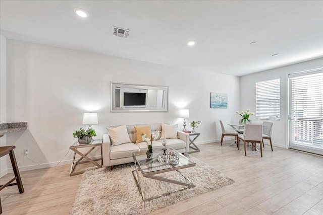 living room featuring light wood-type flooring