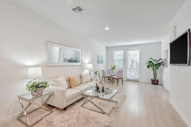 living room with light wood-type flooring