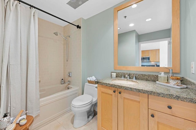 bathroom featuring shower / bath combo, visible vents, toilet, tile patterned flooring, and vanity