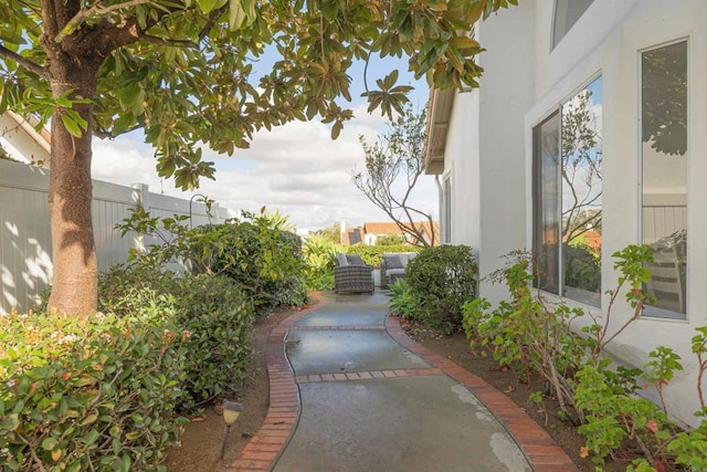 view of yard featuring a patio area and outdoor lounge area