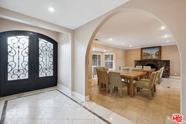 foyer entrance featuring french doors