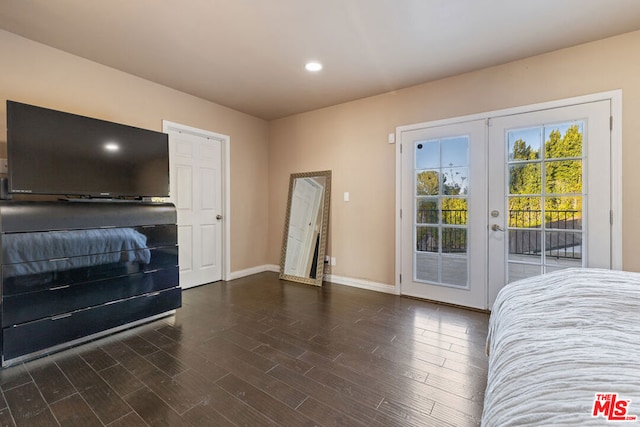 bedroom featuring french doors and access to outside