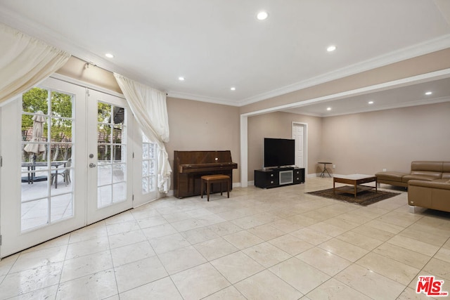 living room featuring crown molding and french doors