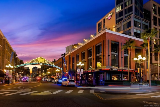 view of outdoor building at dusk