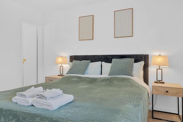 bedroom featuring hardwood / wood-style flooring