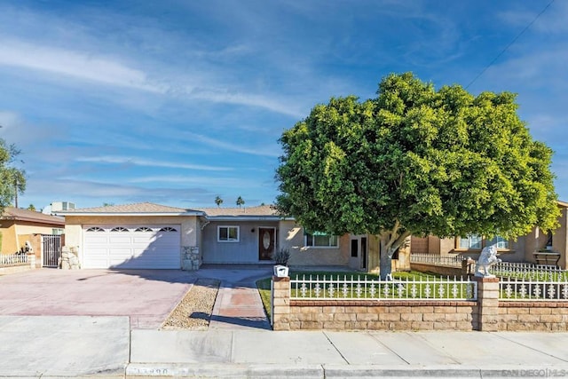 ranch-style home featuring a garage