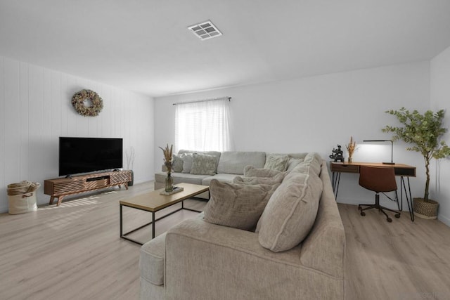 living room featuring light hardwood / wood-style floors