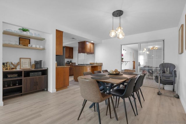 dining area featuring light hardwood / wood-style flooring