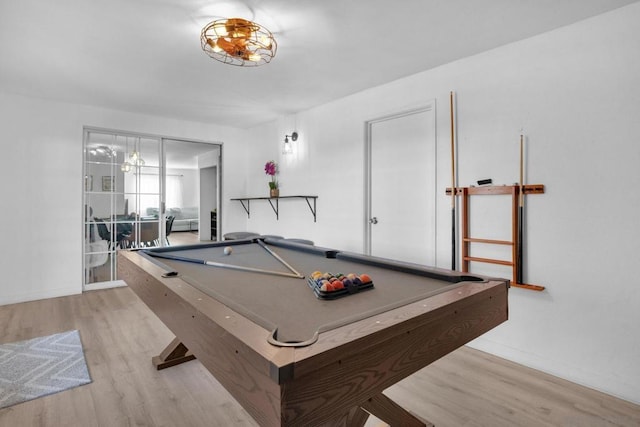 recreation room with pool table and light wood-type flooring