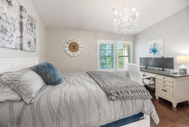 bedroom featuring lofted ceiling, a notable chandelier, and dark wood-type flooring