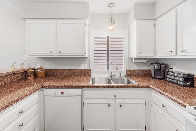 kitchen with white cabinetry, sink, decorative light fixtures, and dishwasher