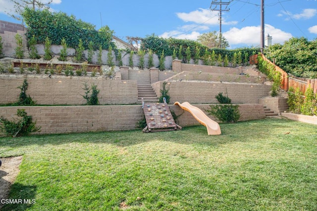 view of yard with a playground