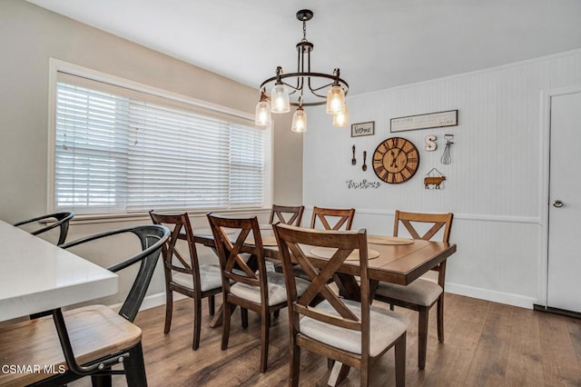 dining space with dark hardwood / wood-style flooring