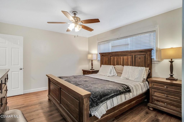 bedroom featuring ceiling fan and hardwood / wood-style floors