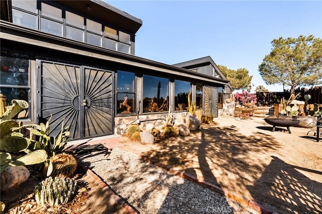 rear view of house with a patio area