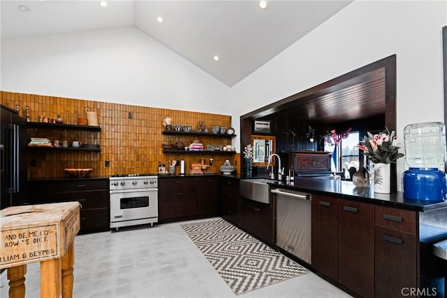 kitchen with sink, dark brown cabinets, high vaulted ceiling, and appliances with stainless steel finishes