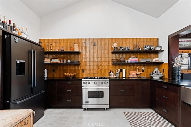 kitchen featuring high end appliances, dark brown cabinetry, and vaulted ceiling