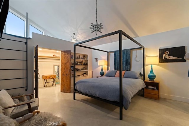 bedroom with high vaulted ceiling