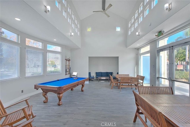 game room featuring billiards, baseboards, a wealth of natural light, and wood finished floors