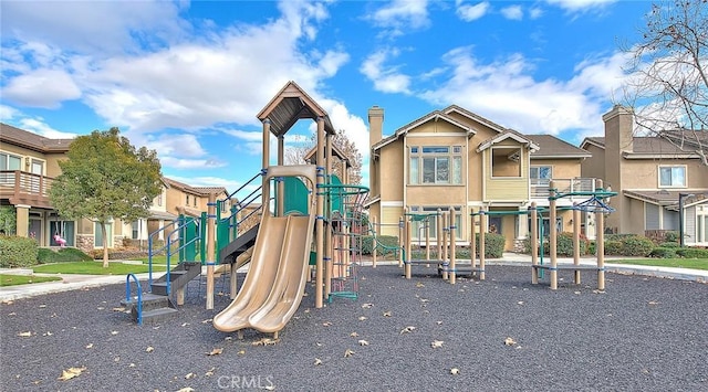 community playground featuring a residential view