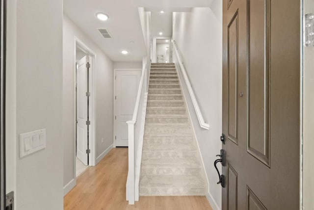 entrance foyer featuring light wood-type flooring