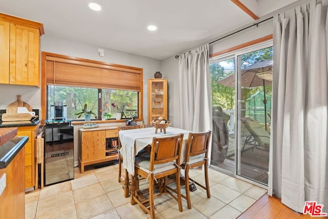 dining area featuring light tile patterned floors