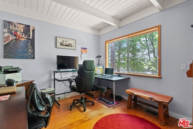 office area featuring beamed ceiling, wood ceiling, and hardwood / wood-style floors