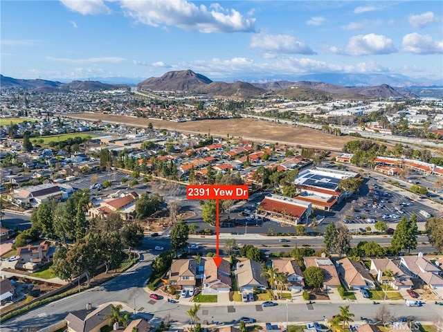 drone / aerial view featuring a mountain view