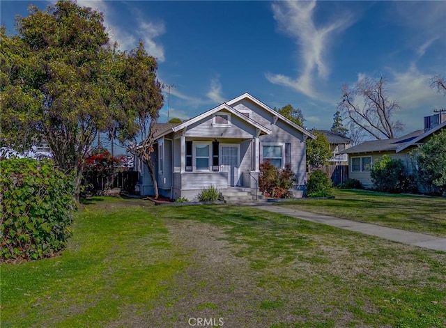 bungalow with a front yard