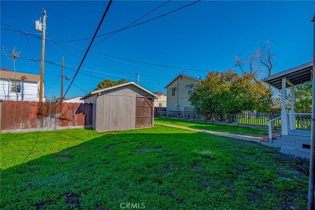 view of yard with a storage shed