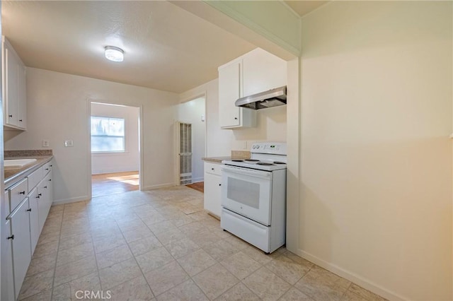 kitchen with white cabinetry, sink, exhaust hood, and white range with electric cooktop