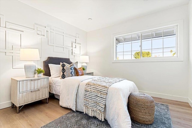 bedroom featuring hardwood / wood-style flooring