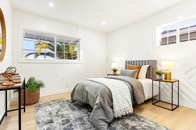 bedroom featuring light hardwood / wood-style floors