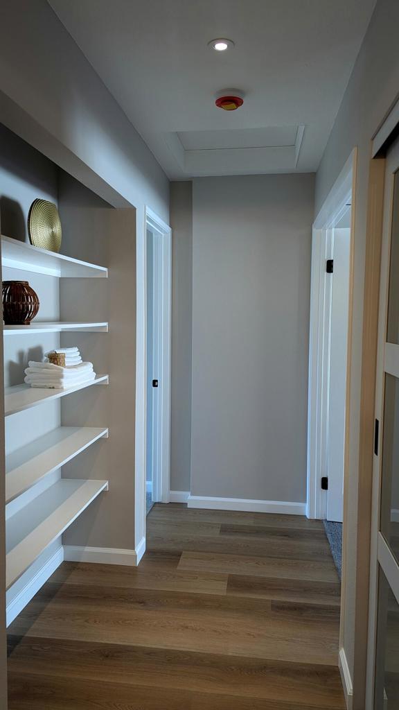 corridor featuring dark hardwood / wood-style flooring